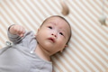 Cute baby relaxing and watching hanging toy - PhotoDune Item for Sale