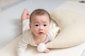 Newborn baby crawl on mat inside the home - PhotoDune Item for Sale