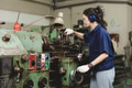 Engineer women working in Lathe shop with metal machinery lathe milling machine - PhotoDune Item for Sale
