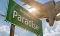 Welcome to Paradise Green Road Sign with Airplane Above. - PhotoDune Item for Sale
