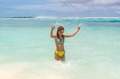 Cute Girl Playing at the Beach - PhotoDune Item for Sale