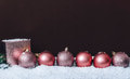 Christmas background with pink xmas ornaments with snowflake on black background. New year backdrop - PhotoDune Item for Sale