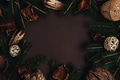 Christmas frame with pine tree home decor flat lay background. Dark minimal new year - PhotoDune Item for Sale