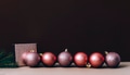 Pink christmas balls on brown and beige wall. Elegant Christmas decoration background. - PhotoDune Item for Sale