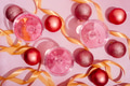 Pink champagne in luxury crystal glasses and christmas baubles New year eve celebration - PhotoDune Item for Sale
