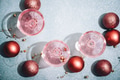 Pink champagne in crystal glasses on shiny mint blur background. New year celebration party - PhotoDune Item for Sale