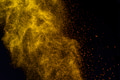 Gold glitter stardust trail on black background. Christmas golden spark Luxury new year holiday - PhotoDune Item for Sale