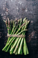 Fresh asparagus on rustic black kitchen table from above. - PhotoDune Item for Sale