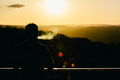 Man smoking watching the sun set - PhotoDune Item for Sale