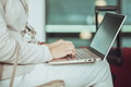 business people using laptop computer during waiting flight travel trip at the airport waiting area - PhotoDune Item for Sale