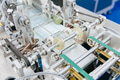 Face mask, Surgical mask production line, Closeup machine conveyor belt roller in hygiene factory - PhotoDune Item for Sale