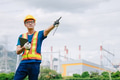 Professional engineer male with coal power plant, Power station with green nature background - PhotoDune Item for Sale