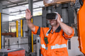Engineer male using VR headset device to control operate robot arm in modern technology industry - PhotoDune Item for Sale