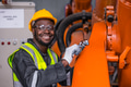 African American Black Engineer Professional Worker Working in Heavy Industry in Safety Uniform - PhotoDune Item for Sale