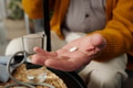 Senior Caucasian Man Holding Pill in Hand and Preparing for Medication - PhotoDune Item for Sale