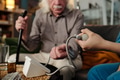 Senior Caucasian Man Having Blood Pressure Checked by Healthcare Worker - PhotoDune Item for Sale