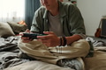 Teenage Caucasian Boy Sitting on Bed Using Game Controller Experiencing Gadget Addiction - PhotoDune Item for Sale