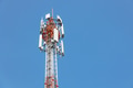 Communication towers on blue sky, 5G networks post. Network cell site. Omni direction data link - PhotoDune Item for Sale