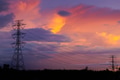 Electricity Power line, High voltage power transmission tower to urban against twilight sky. - PhotoDune Item for Sale