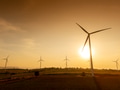 Wind turbine farm filed on sunset sky clean power system, eco green clean alternative saving energy. - PhotoDune Item for Sale