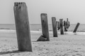 old abandoned concrete pole in the beach shore, black and white art photography - PhotoDune Item for Sale