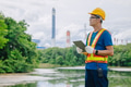 Professional engineer male with coal power plant, Power station with green nature background - PhotoDune Item for Sale