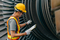 Professional Asian engineer male working service power plant turbine fan blade electrical generator - PhotoDune Item for Sale