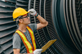 Professional Asian engineer male working service power plant turbine fan blade electrical generator - PhotoDune Item for Sale