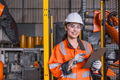 Smart engineer Asian women robot technician worker happy smiling in modern factory industry - PhotoDune Item for Sale