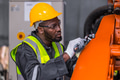 African American Black Engineer Professional Worker Working in Heavy Industry in Safety Uniform - PhotoDune Item for Sale