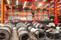 Metal sheet roll, steel sheet roll stock pile storage warehouse heavy industry manufacturing plant. - PhotoDune Item for Sale