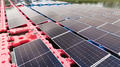 Drone view of Floating Solar Panel. Solar photovoltaic panel PV System in Industry lake water pond - PhotoDune Item for Sale