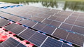 Drone view of Floating Solar Panel. Solar photovoltaic panel PV System in Industry lake water pond - PhotoDune Item for Sale