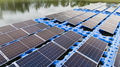 Drone view of Floating Solar Panel. Solar photovoltaic panel PV System in Industry lake water pond - PhotoDune Item for Sale
