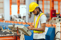 Professional African black worker working machine operator in heavy industry factory supervisor - PhotoDune Item for Sale