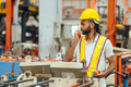 Professional African black worker working machine operator in heavy industry factory supervisor - PhotoDune Item for Sale