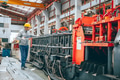 Professional senior Industrial worker in protective helmet and uniform service machinery in factory - PhotoDune Item for Sale