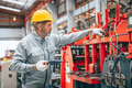 Professional senior Industrial worker in protective helmet and uniform service machinery in factory - PhotoDune Item for Sale