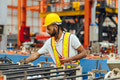 Professional African black worker working machine operator in heavy industry factory supervisor - PhotoDune Item for Sale