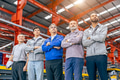 Group of male team workers mix race standing together happy success work in heavy industry factory - PhotoDune Item for Sale