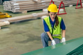 Asian woman engineer worker, professional employee working in metal sheet plant factory - PhotoDune Item for Sale