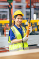 Young Asian woman engineer worker happy smiling professional working in heavy industry plant factory - PhotoDune Item for Sale
