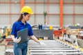 Young Asian woman teen engineer worker, professional working check machine in metal sheet factory - PhotoDune Item for Sale