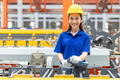 Young Asian woman engineer worker happy smiling professional working in heavy industry plant factory - PhotoDune Item for Sale