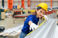 Young Asian woman engineer worker measuring product size, professional work in metal sheet factory - PhotoDune Item for Sale
