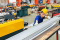 Young Asian woman engineer worker measuring product size, professional work in metal sheet factory - PhotoDune Item for Sale