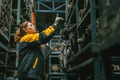 Technician adult women worker working in heavy industry, warehouse manager in garage scrap yard - PhotoDune Item for Sale