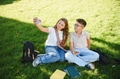 Schoolchildren friends taking selfie with smartphone outdoors - PhotoDune Item for Sale