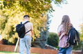 Students walking to school with backpacks outdoors - PhotoDune Item for Sale