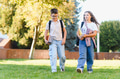 School children walking with backpacks and books - PhotoDune Item for Sale